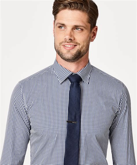 tie with blue check shirt.